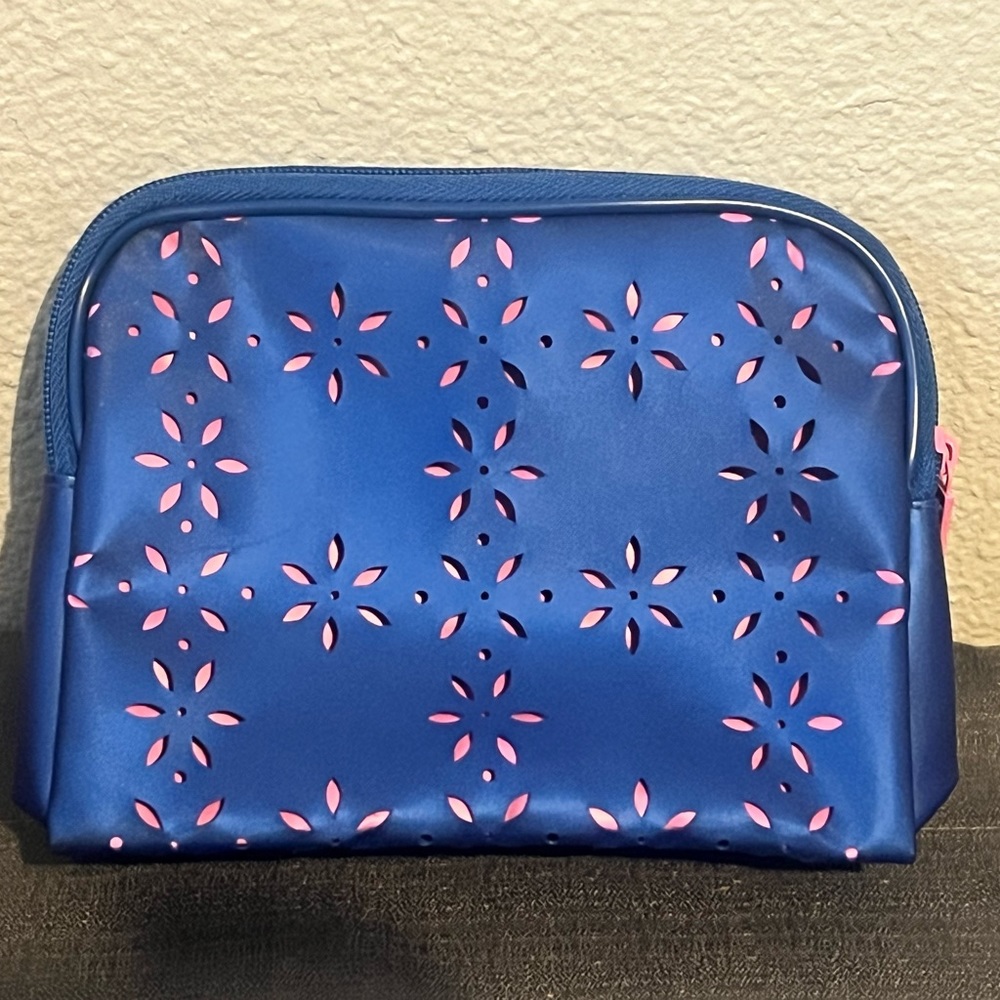 Clinique purple and pink cut out makeup bag